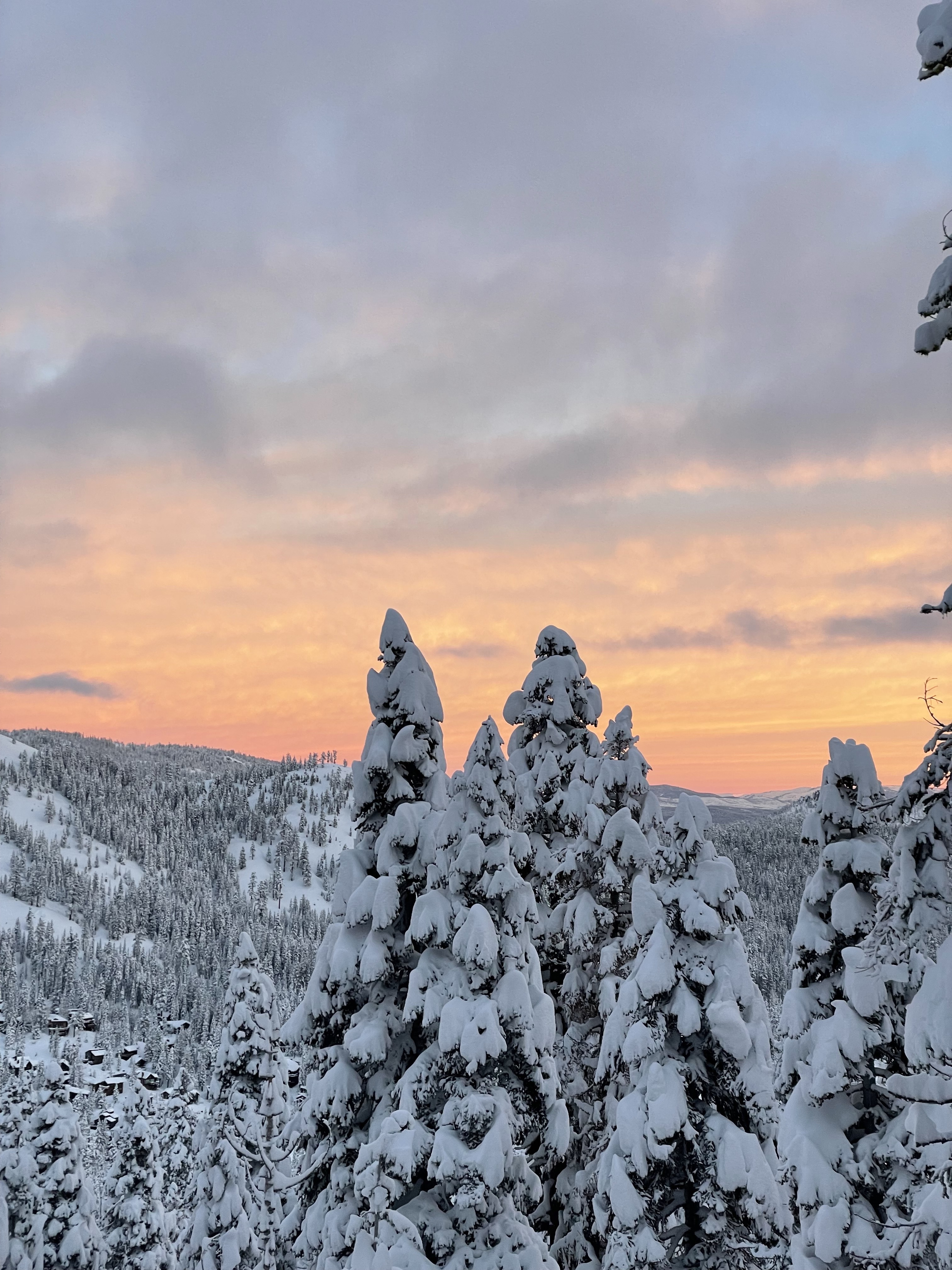 Alpenglow over snowy mountains